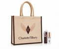 Charlotte Tilbury: Tote Bag + Mini Spray Fijador + Llavero Charm